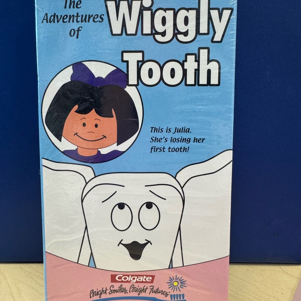 Blue and Pink Cartoon Tooth Adventure VHS